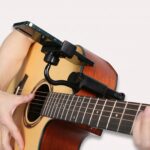 Telefonholder til guitar med sikker fastgørelse og nem adgang til digitale noder