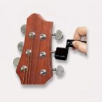 værktøjssæt til guitarreparation i sort, lyseblå og pink til hurtigere strengskift og justering - Rejse product image