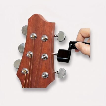 værktøjssæt til guitarreparation i sort, lyseblå og pink til hurtigere strengskift og justering - Rejse product image
